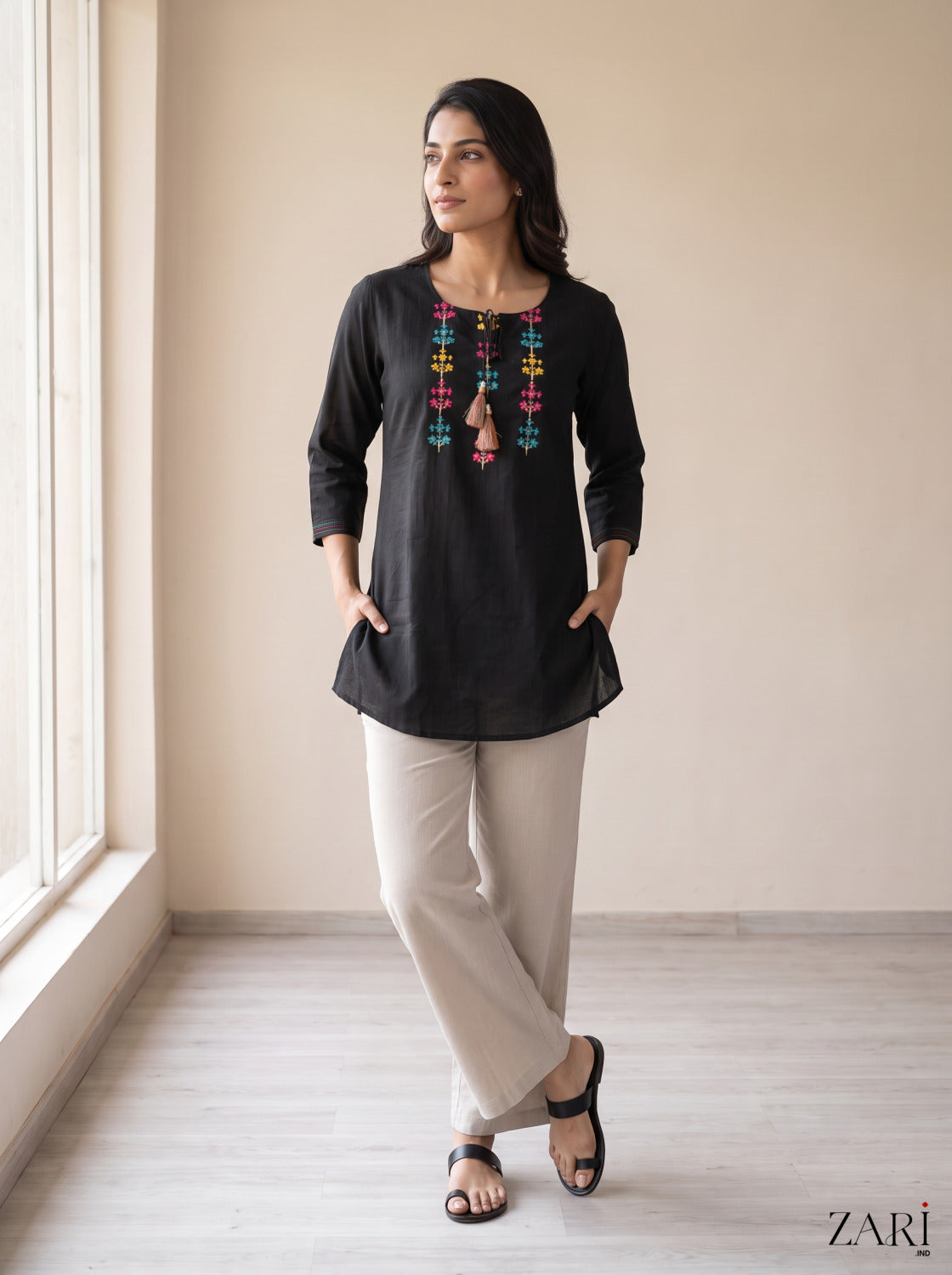 Black Cotton Kurti with Multicolor Embroidery & Tassels