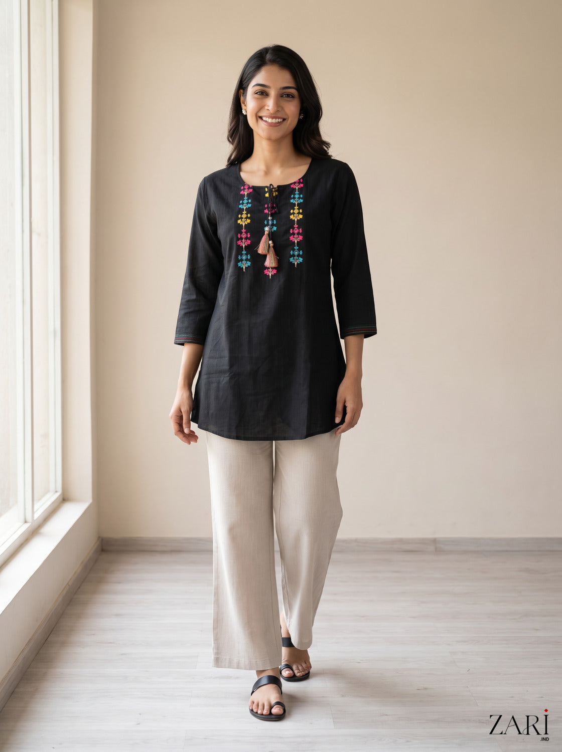 Black Cotton Kurti with Multicolor Embroidery & Tassels
